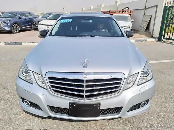 Image of a pre-owned 2010 silver Mercedes-Benz E350 car