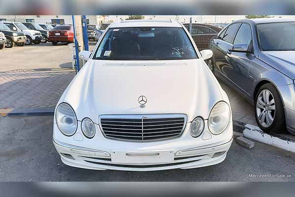 Image of a pre-owned 2004 white Mercedes-Benz E320 car