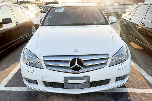 Image of a pre-owned 2009 white Mercedes-Benz C250 car