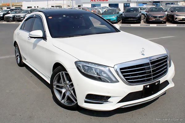 Image of a pre-owned 2015 white Mercedes-Benz S400 car