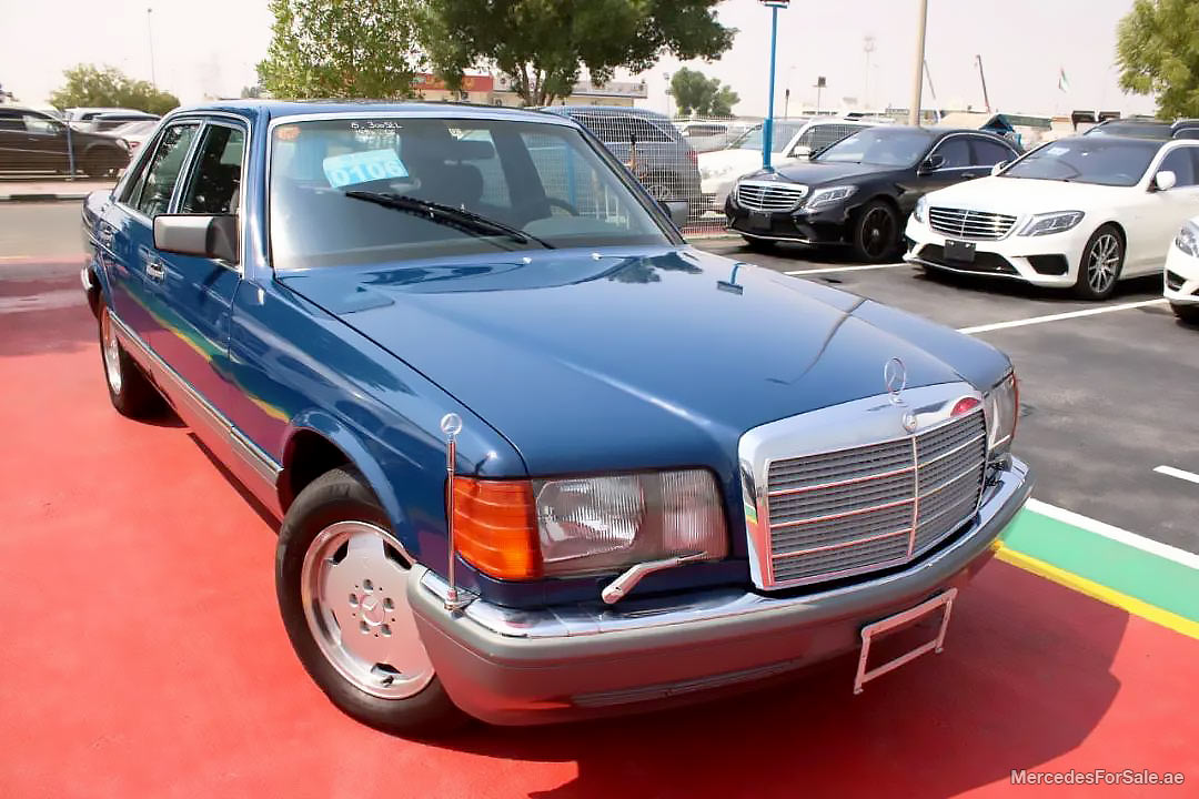 blue 1986 Mercedes se300