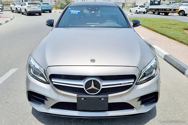 Image of a pre-owned 2020 gold Mercedes-Benz C43 car