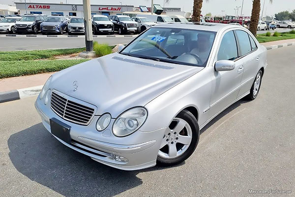 Image of a pre-owned 2005 silver Mercedes-Benz E320 car