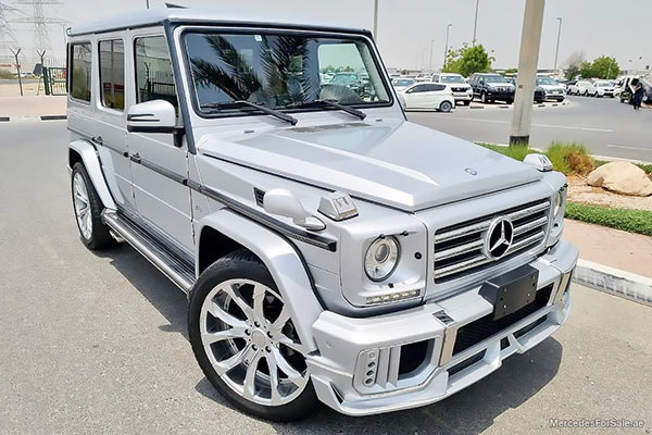 Image of a pre-owned 2013 silver Mercedes-Benz G550 car