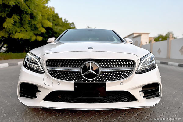 Image of a pre-owned 2020 white Mercedes-Benz C300 car