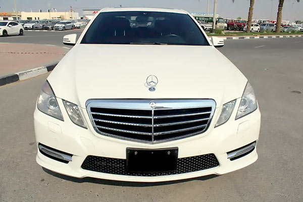 Image of a pre-owned 2012 white Mercedes-Benz E350 car