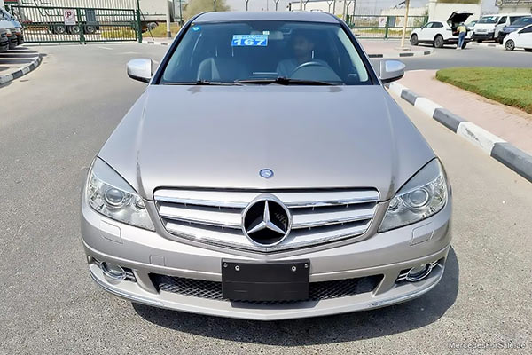 Image of a pre-owned 2008 gold Mercedes-Benz C250 car