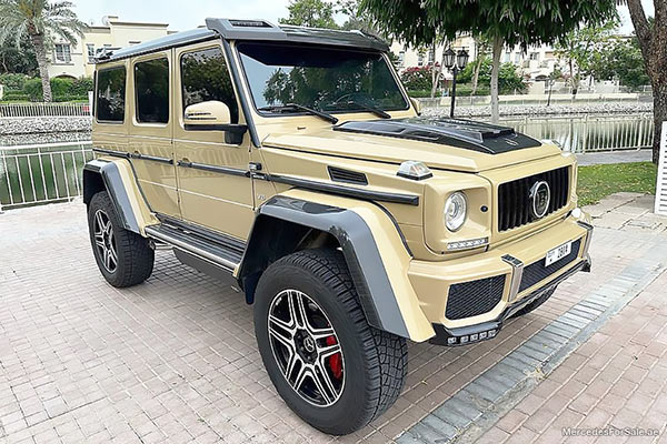 Image of a pre-owned 2016 gold Mercedes-Benz G500 car