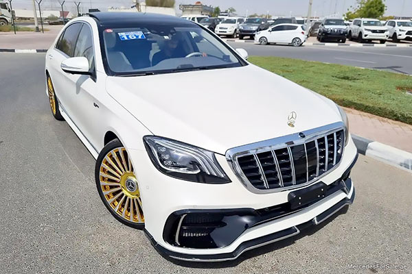 Image of a pre-owned 2014 white Mercedes-Benz S550 car