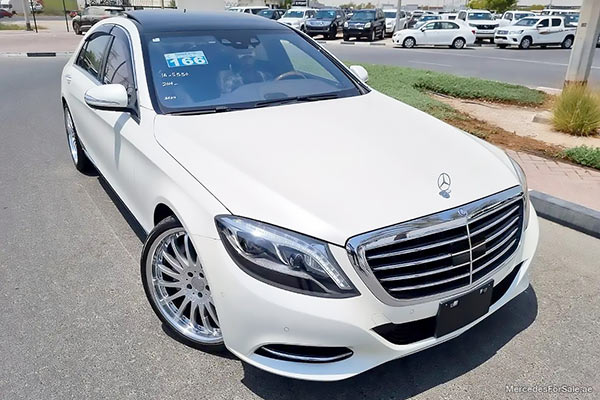 Image of a pre-owned 2014 white Mercedes-Benz S550L car