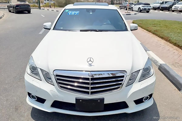 Image of a pre-owned 2010 white Mercedes-Benz E550 car