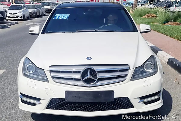 Image of a pre-owned 2012 white Mercedes-Benz C350 car