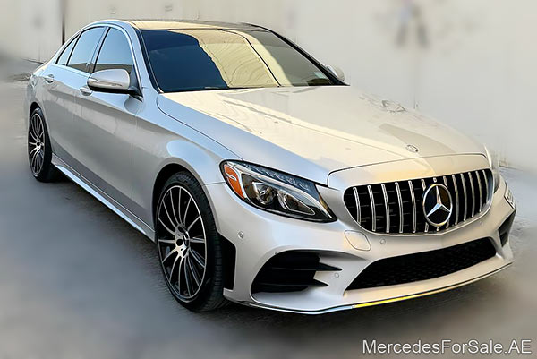 Image of a pre-owned 2015 silver Mercedes-Benz C400 car