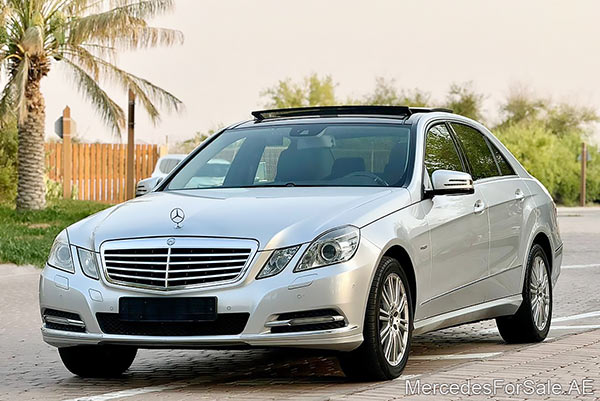 Image of a pre-owned 2012 silver Mercedes-Benz E300 car