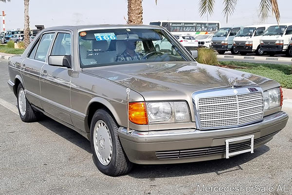 Image of a pre-owned 1991 gold Mercedes-Benz S300 car