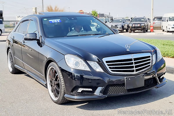 Image of a pre-owned 2011 black Mercedes-Benz E550 car