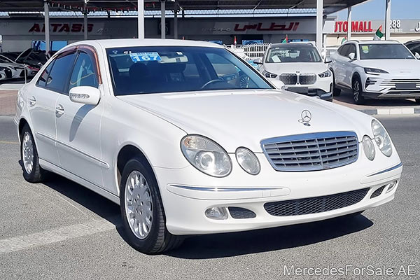 Image of a pre-owned 2003 white Mercedes-Benz E240 car