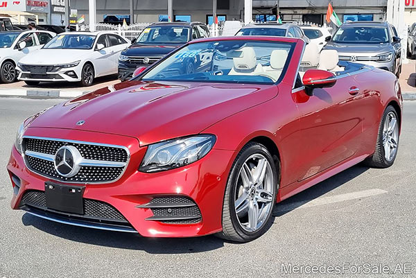 Image of a pre-owned 2018 red Mercedes-Benz E400 car