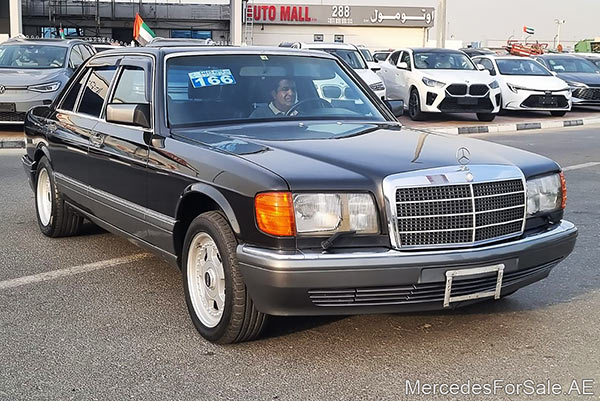 Image of a pre-owned 1990 black Mercedes-Benz S560 car