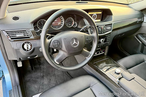 blue 2010 Mercedes e350