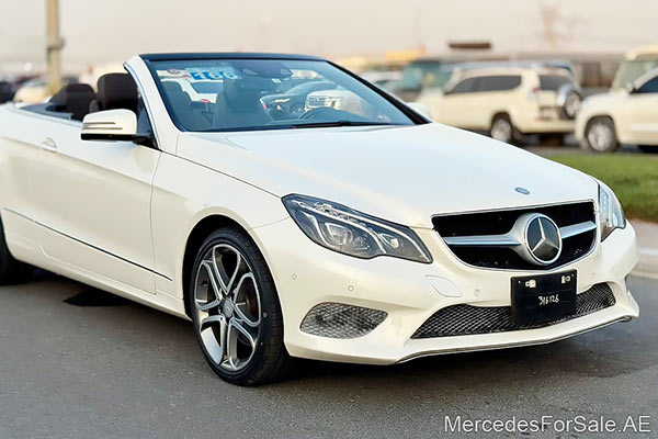 Image of a pre-owned 2014 white Mercedes-Benz E350 car